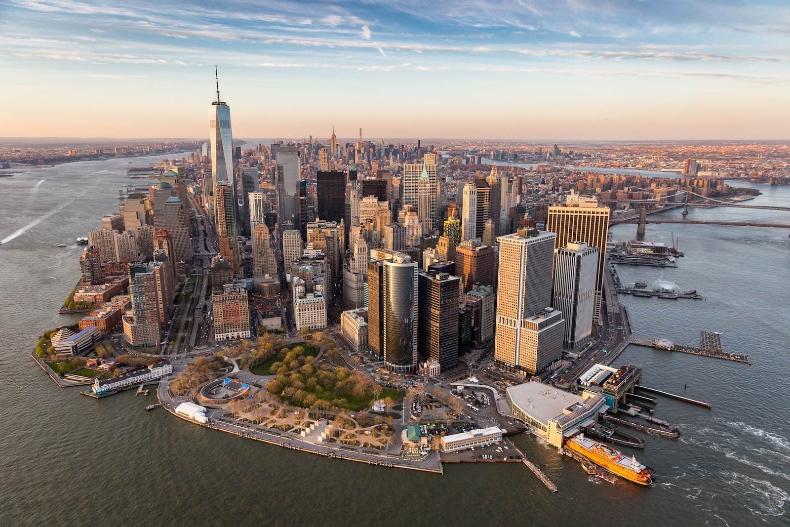 Aerial view of the Lower Manhattan skyline at sunset